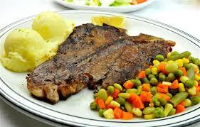 T-Bone steak and vegetables.